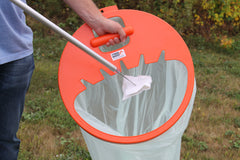 orange litter pick up tool the trash bagger